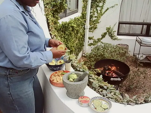 Guacamole, fire behind