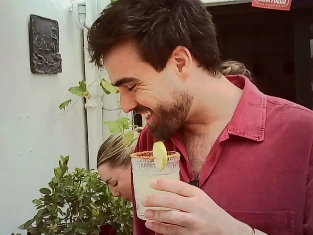 Laughing into the glass